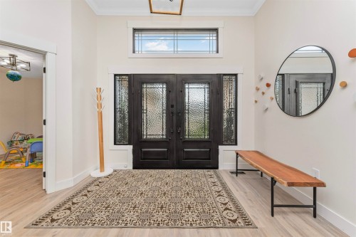 Double entry doors with decorative glass panels and sidelights - 627 Forest Lane, Edmonton, AB - Indoor Photo Showing Other Room