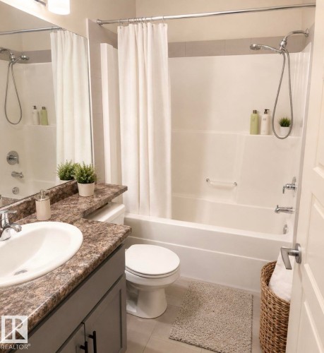 Contemporary bathroom featuring a combination shower and tub, a vanity with a stone-finish countertop, an undermount sink, a large wall-mounted mirror, and tile flooring - 228 308 Ambleside Link Sw, Edmonton, AB - Indoor Photo Showing Bathroom