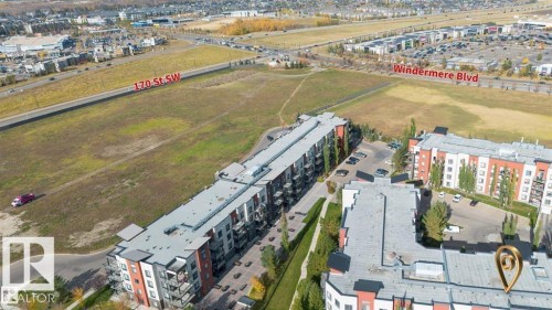 Aerial perspective of a multi-building residential complex - 228 308 Ambleside Link Sw, Edmonton, AB - Outdoor With View