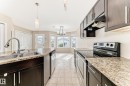 7706 Schmid Crescent, Edmonton, AB  - Indoor Photo Showing Kitchen With Double Sink With Upgraded Kitchen 