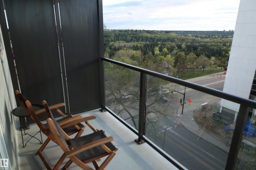 Balcony with glass railing and privacy screens, with a wonderful view of the North Saskatchewan River Valley - 807 10011 116 Street, Edmonton, AB - Outdoor With Balcony With View