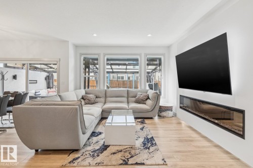 17618 63A Street, Edmonton, AB - Indoor Photo Showing Living Room With Fireplace