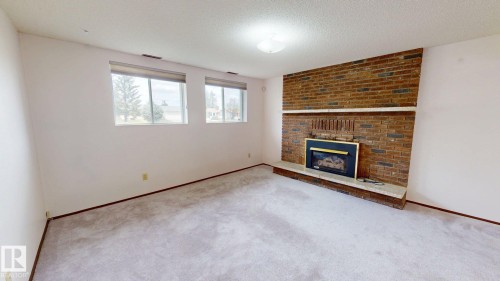 4521 42 Avenue, Drayton Valley, AB - Indoor Photo Showing Other Room With Fireplace