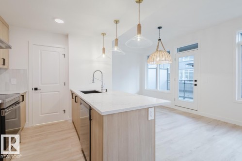 3 16231 19 Avenue, Edmonton, AB - Indoor Photo Showing Kitchen With Upgraded Kitchen