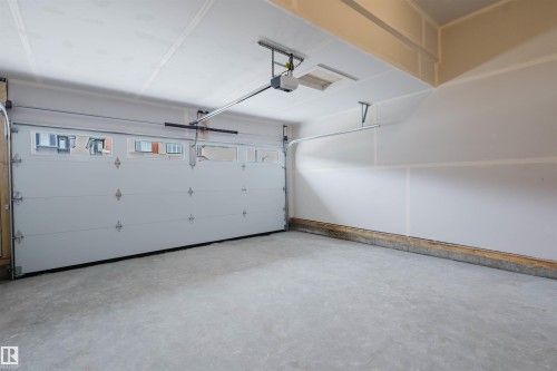 8243 Kiriak Loop, Edmonton, AB - Indoor Photo Showing Garage