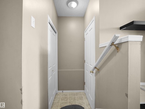 Entryway with neutral wall tones and tile flooring - 16121 131A Street, Edmonton, AB - Indoor Photo Showing Other Room