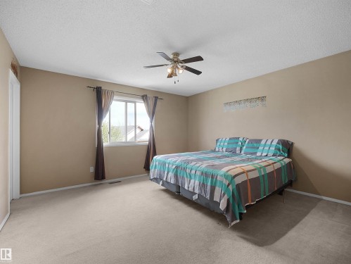Carpeted room with neutral-toned walls - 16121 131A Street, Edmonton, AB - Indoor Photo Showing Bedroom
