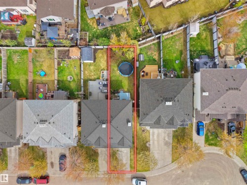 Aerial perspective showcasing the property's footprint, featuring a detached single-family residence with a gray shingle roof - 16121 131A Street, Edmonton, AB -  With View