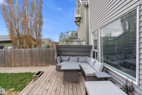 Outdoor deck featuring wood planks and a privacy fence - 2007 74 Street, Edmonton, AB - Outdoor With Deck Patio Veranda With Exterior
