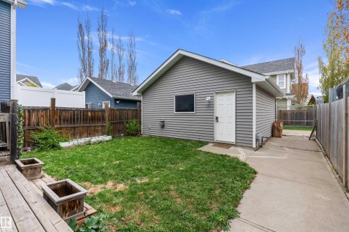 Detached garage with horizontal siding and a side entry door - 2007 74 Street, Edmonton, AB - Outdoor With Exterior