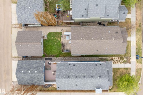 Top-down aerial view showcasing multiple residential properties with asphalt shingle roofs - 2007 74 Street, Edmonton, AB - Outdoor
