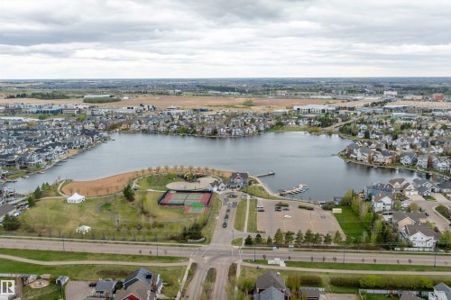Aerial perspective showcasing a lake with surrounding residential properties - 2007 74 Street, Edmonton, AB - Outdoor With Body Of Water With View