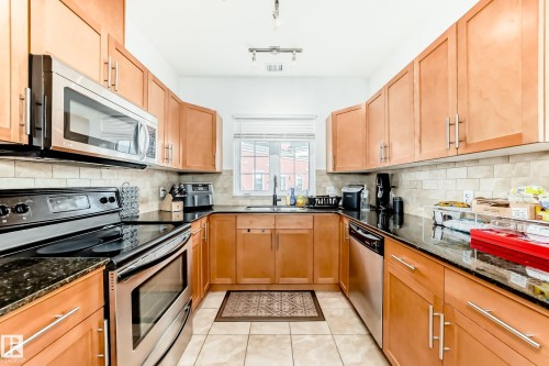309 1003 Gault Boulevard, Edmonton, AB - Indoor Photo Showing Kitchen With Double Sink