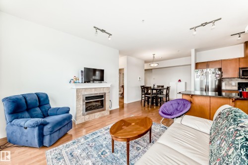309 1003 Gault Boulevard, Edmonton, AB - Indoor Photo Showing Living Room With Fireplace