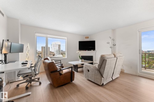 1602 10649 Saskatchewan Drive, Edmonton, AB - Indoor Photo Showing Living Room With Fireplace