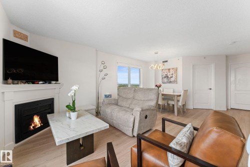 1602 10649 Saskatchewan Drive, Edmonton, AB - Indoor Photo Showing Living Room With Fireplace