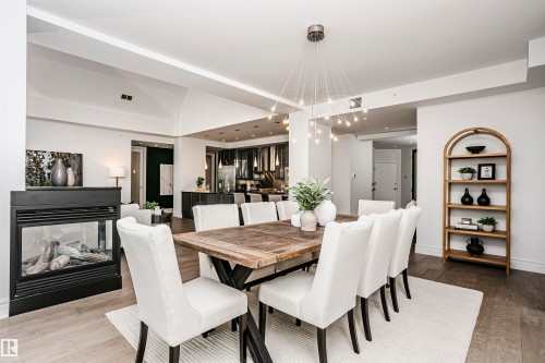 2104 9020 Jasper Avenue, Edmonton, AB - Indoor Photo Showing Dining Room With Fireplace
