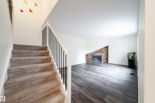 5642 148 Street, Edmonton, AB - Indoor Photo Showing Other Room With Fireplace