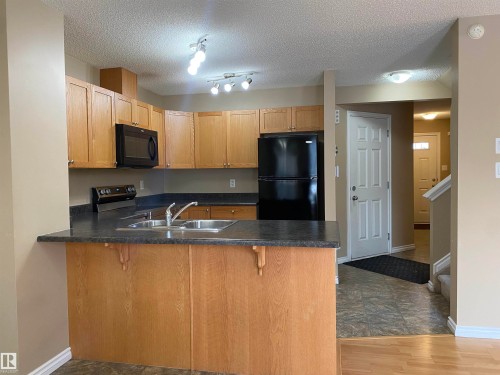 6411 18 Avenue, Edmonton, AB - Indoor Photo Showing Kitchen With Double Sink