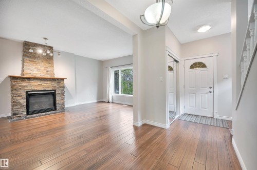 11028 84 Avenue, Edmonton, AB - Indoor Photo Showing Living Room With Fireplace