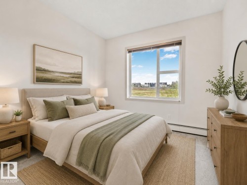 218 320 Ambleside Link, Edmonton, AB - Indoor Photo Showing Bedroom