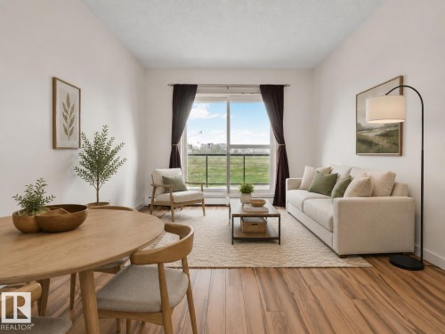 218 320 Ambleside Link, Edmonton, AB - Indoor Photo Showing Living Room