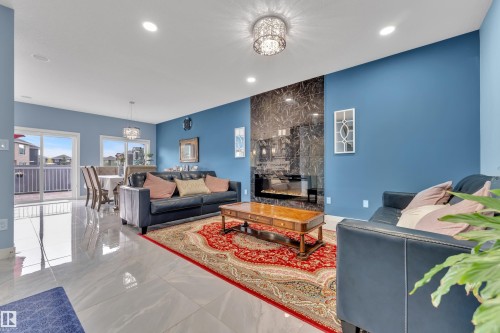 16016 34 Avenue, Edmonton, AB - Indoor Photo Showing Living Room With Fireplace