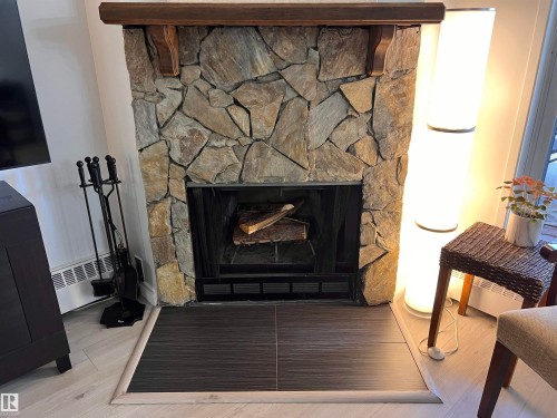 106 10421 93 Street Nw, Edmonton, AB - Indoor With Fireplace