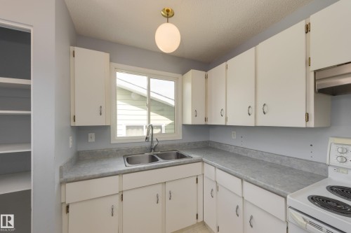 2058 74 Street, Edmonton, AB - Indoor Photo Showing Kitchen With Double Sink