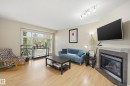 11337 76 Avenue, Edmonton, AB  - Indoor Photo Showing Living Room With Fireplace 