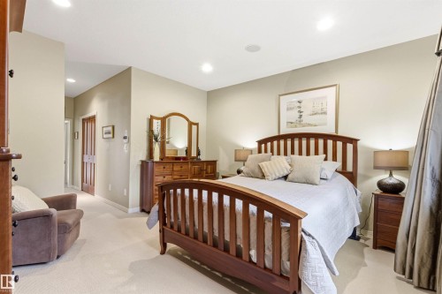 Carpeted room with recessed lighting and a ceiling-mounted speaker - 1728 Rutherford Pt Point(E) Sw, Edmonton, AB - Indoor Photo Showing Bedroom