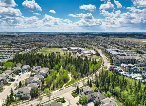 Expansive residential area featuring a mix of single-family homes and multi-story apartment buildings - 1728 Rutherford Pt Point(E) Sw, Edmonton, AB - Outdoor With View