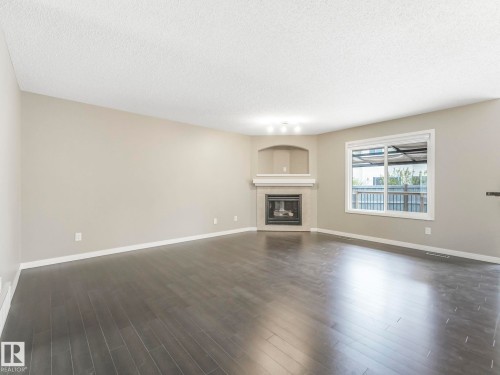7912 172 Avenue, Edmonton, AB - Indoor Photo Showing Living Room With Fireplace