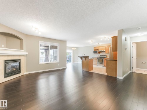 7912 172 Avenue, Edmonton, AB - Indoor Photo Showing Living Room With Fireplace