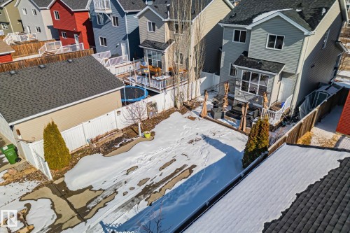 The property features a spacious backyard with a deck and a gazebo, creating an inviting outdoor living area - 336 Southfork Drive, Leduc, AB - Outdoor