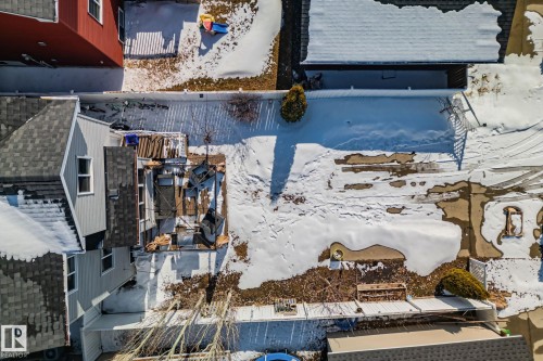 Aerial view of the property showing the exterior, roof, and yard space - 336 Southfork Drive, Leduc, AB - Outdoor