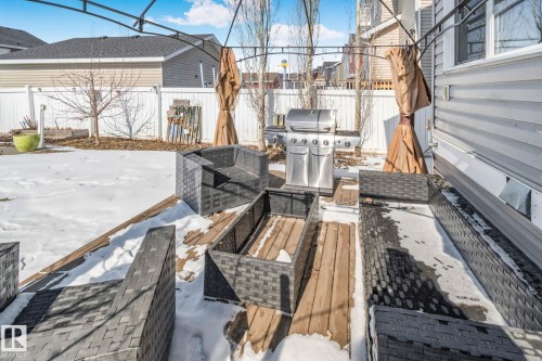 Outdoor patio area featuring a wooden deck and a metal pergola structure - 336 Southfork Drive, Leduc, AB - Outdoor