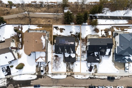 Aerial view of the property, featuring a dark-colored roof with visible solar panels - 10673 161 Avenue, Edmonton, AB - Outdoor