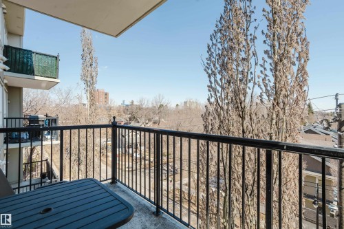 Private balcony featuring a black metal railing and concrete flooring - 508 11103 84 Avenue, Edmonton, AB - Outdoor With Balcony With Exterior