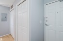 Entryway featuring light wood-finish flooring, light gray walls, and white trim - 508 11103 84 Avenue, Edmonton, AB  - Indoor Photo Showing Other Room 