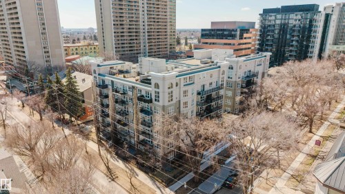 Multi-story building featuring light-toned exterior siding and multiple balconies - 508 11103 84 Avenue, Edmonton, AB - Outdoor