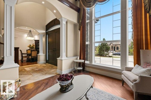 Grand foyer featuring a tall, arched double-door entry - 58 Riverstone Close, Rural Sturgeon County, AB - Indoor