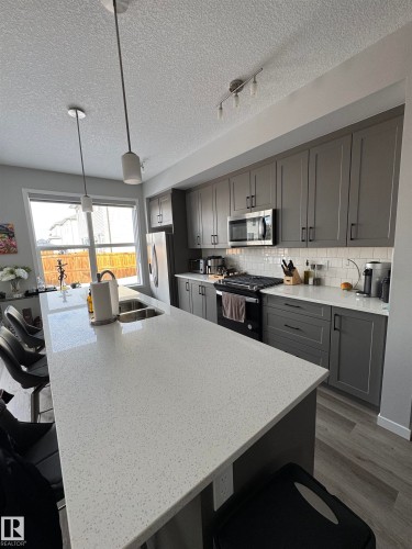 2514/2518 151A Avenue, Edmonton, AB - Indoor Photo Showing Kitchen With Double Sink