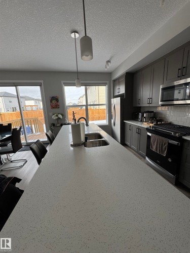 2514/2518 151A Avenue, Edmonton, AB - Indoor Photo Showing Kitchen With Double Sink