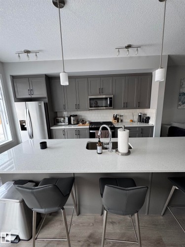 2514/2518 151A Avenue, Edmonton, AB - Indoor Photo Showing Kitchen With Double Sink With Upgraded Kitchen