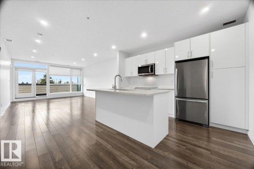 409 11503 76 Avenue, Edmonton, AB - Indoor Photo Showing Kitchen With Stainless Steel Kitchen With Upgraded Kitchen