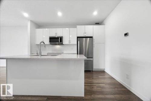 409 11503 76 Avenue, Edmonton, AB - Indoor Photo Showing Kitchen With Stainless Steel Kitchen With Upgraded Kitchen