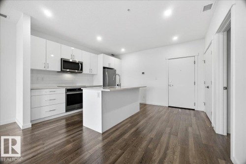 409 11503 76 Avenue, Edmonton, AB - Indoor Photo Showing Kitchen With Stainless Steel Kitchen With Upgraded Kitchen