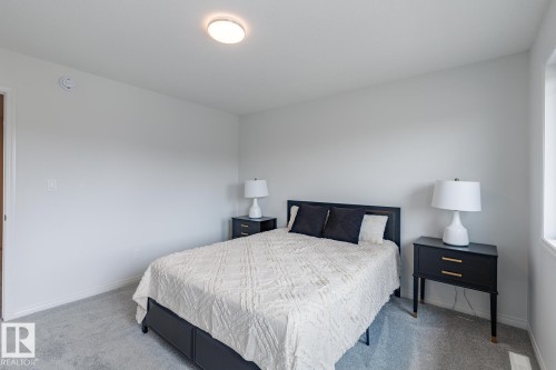 99 Silverstone Drive, Stony Plain, AB - Indoor Photo Showing Bedroom
