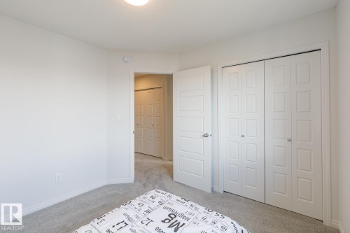 99 Silverstone Drive, Stony Plain, AB - Indoor Photo Showing Bedroom